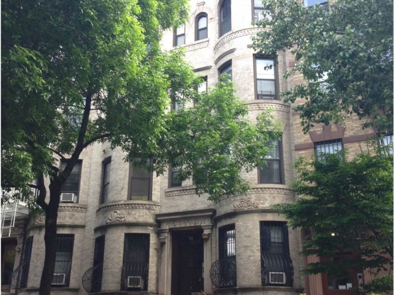 Eight Family Building w/ Five Free Market Apartments