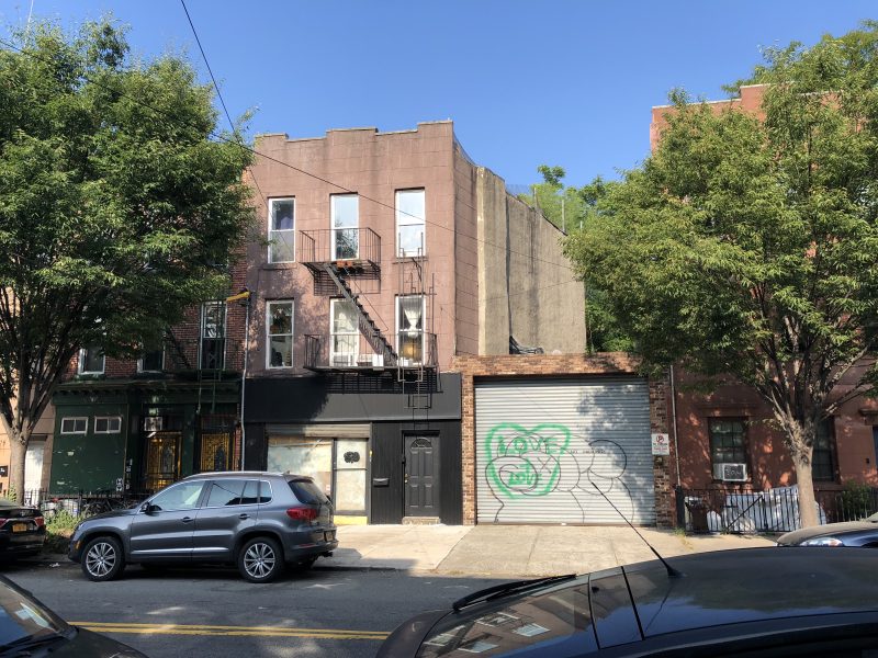 2,205 SF Mixed-Use Property with Parking Lot